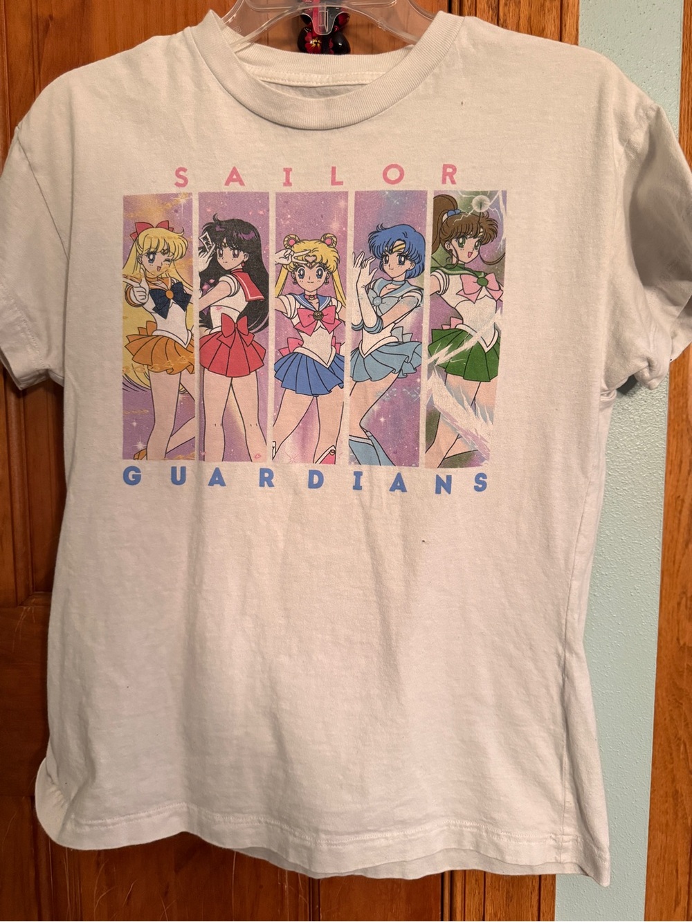 Salomon White Tee with Multicolor Sailor Guardians Graphic